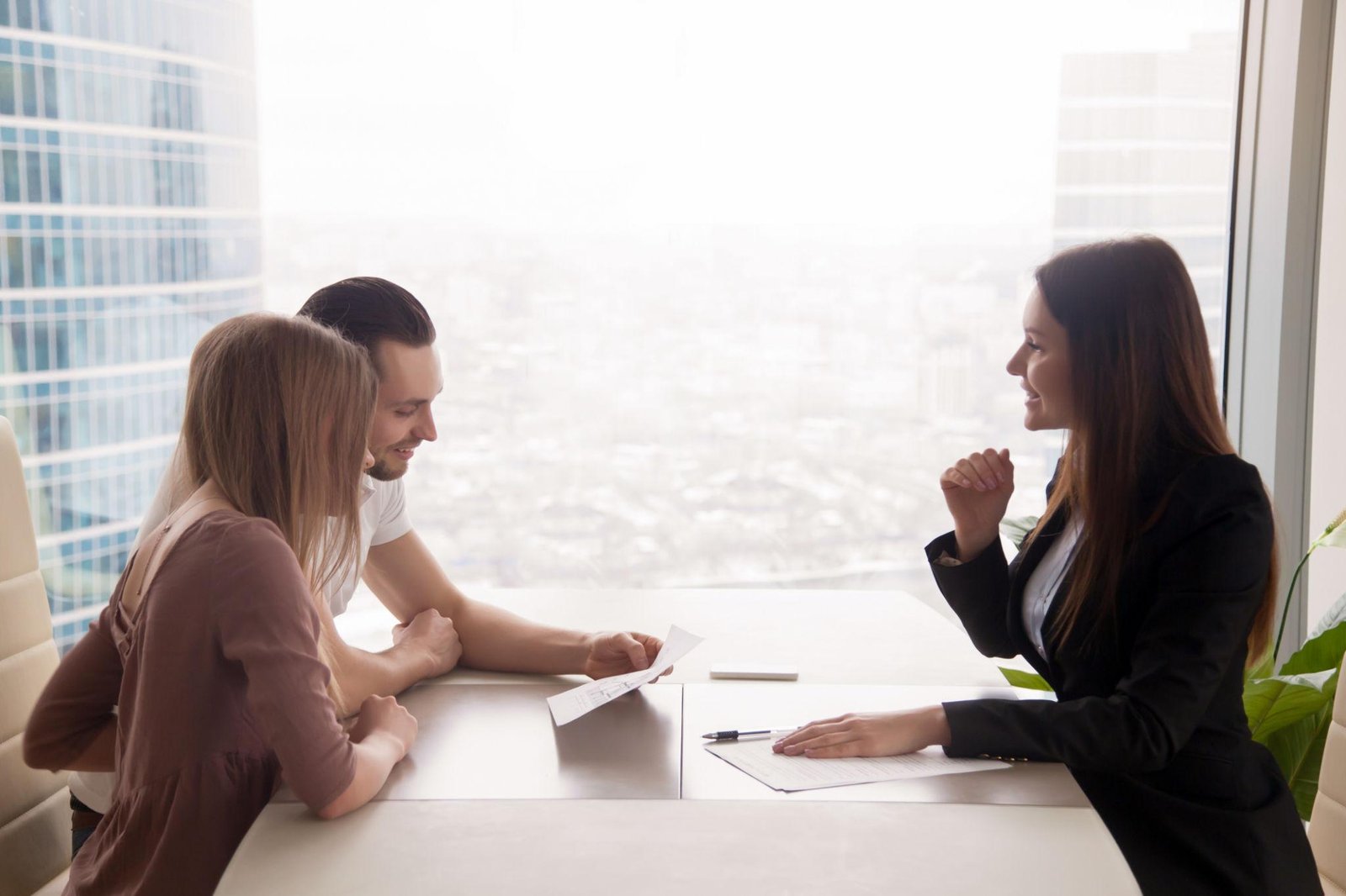 Real estate advisor meeting with clients